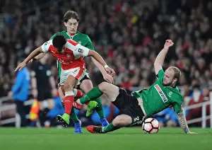 Arsenal's Alexis Sanchez Outmaneuvers Lincoln City Defenders during The Emirates FA Cup Quarter-Final