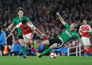 Arsenal's Alexis Sanchez Outmaneuvers Lincoln's Defenders in FA Cup Quarter-Final Showdown
