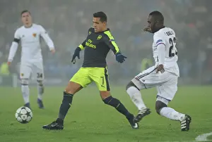 FC Basel V Arsenal 2016-17 Prints: Arsenal's Alexis Sanchez vs. Basel's Eder Balanta: A Champions League Battle