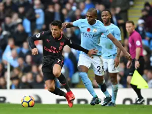 Manchester City V Arsenal 2017-18 Prints: Arsenal's Alexis Sanchez vs Manchester City's Fernandinho: A Premier League Showdown