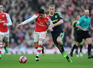Arsenal V Middlesbrough - FA Cup 2014-15 Prints: Arsenal's Alexis Sanchez vs. Middlesbrough's Grant Leadbitter: FA Cup Showdown