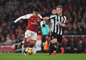 Arsenal V Newcastle United 2017-18 Prints: Arsenal's Alexis Sanchez vs. Newcastle's Matt Ritchie: A Premier League Showdown