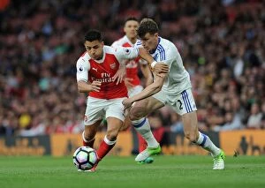 Images Dated 16th May 2017: Arsenal's Alexis Sanchez vs. Sunderland's Billy Jones: A Premier League Face-Off