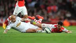Arsenal Swansea City 2014/15 Prints: Arsenal's Alexis Sanchez vs Swansea's Jonjo Shelvey: Foul Clash in 2014/15 Premier League Match