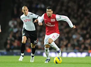 Arsenal V Fulham 2011-12 Prints: Arsenal's Andre Santos Clashes with Fulham's Bobby Zamora in Premier League Showdown