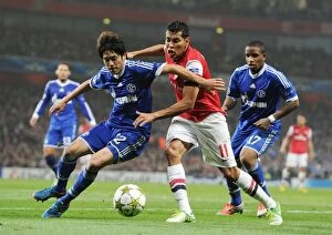 Images Dated 24th October 2012: Arsenal's Andre Santos Clashes with Schalke's Atsuto Uchida and Jefferson Farfan