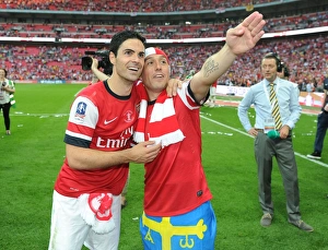 Arsenal V Hull City - FA Cup Final 2014 Prints: Arsenal's Arteta and Cazorla Celebrate FA Cup Victory