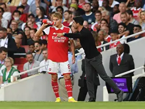 Arsenal's Arteta Gives Instructions to Odegaard During Arsenal v Fulham Premier League Clash (2022-23)