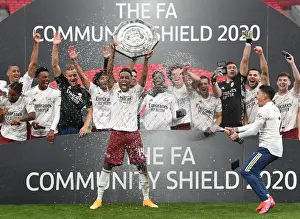 Arsenal's Aubameyang Celebrates FA Community Shield Victory with Champagne Deluge