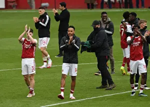 Arsenal's Aubameyang Celebrates with Fans after Arsenal v Brighton Win