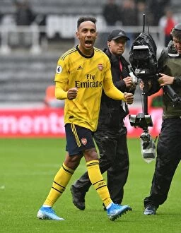 Images Dated 11th August 2019: Arsenal's Aubameyang Celebrates Goal Against Newcastle United in 2019-20 Premier League