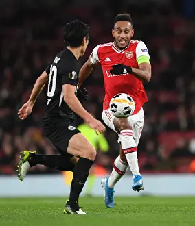Arsenal's Aubameyang Clashes with Eintracht Frankfurt's Hasebe in Europa League Showdown