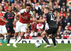 Images Dated 23rd September 2018: Arsenal's Aubameyang Clashes with Everton's Kenny in Premier League Showdown
