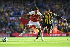 Arsenal V Watford 2018-19 Prints: Arsenal's Aubameyang Clashes with Watford's Capoue in Premier League Showdown