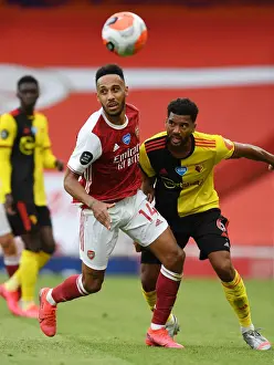 Arsenal's Aubameyang Clashes with Watford's Mariappa in Premier League Showdown