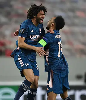 Olympiacos V Arsenal 2020-21 Prints: Arsenal's Aubameyang and Elneny Celebrate Goals in Empty Olympiacos Stadium during Europa League Match