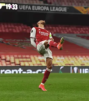 Arsenal's Aubameyang Expresses Frustration in Empty Emirates During Europa League Match vs. Olympiacos