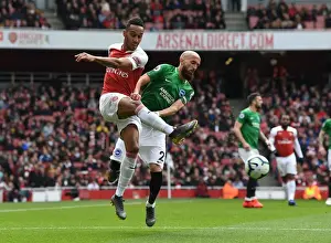 Arsenal's Aubameyang Faces Off Against Brighton's Bruno in Intense Premier League Clash