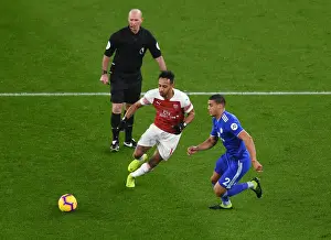 Arsenal V Cardiff City 2018-19 Prints: Arsenal's Aubameyang Faces Off Against Cardiff's Peltier in Premier League Clash