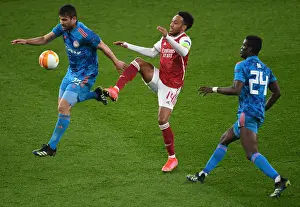 Arsenal's Aubameyang Faces Off in Empty Emirates Stadium: Pierre-Emerick Aubameyang vs. Olympiacos in the UEFA Europa League Amidst COVID-19 Restrictions