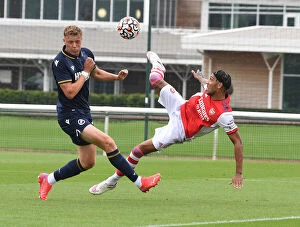 Arsenal v Millwall 2021-22 Collection: Arsenal's Aubameyang Faces Off Against Millwall's Ballard in 2021-22 Pre-Season Friendly