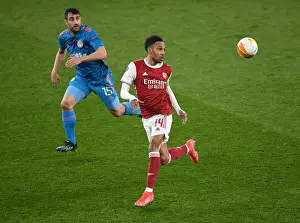 Arsenal's Aubameyang Faces Off Against Olympiacos in Empty Emirates: Europa League Clash Amidst Pandemic