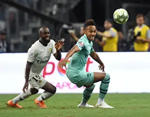 Arsenal's Aubameyang Faces Off Against PSG's Diarra in International Champions Cup Clash