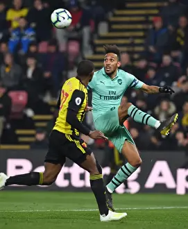 Arsenal's Aubameyang Faces Off Against Watford's Kabasele in Premier League Clash
