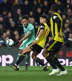 Arsenal's Aubameyang Faces Off Against Watford's Masina in Premier League Clash