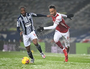 Images Dated 2nd January 2021: Arsenal's Aubameyang Faces Off Against WBA's Sawyers in Premier League Clash