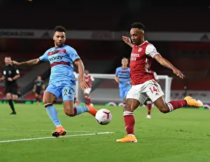 Arsenal's Aubameyang Faces Off Against West Ham's Fredericks in 2020-21 Premier League Clash