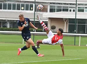 Arsenal V Millwall 2021-22 Prints: Arsenal's Aubameyang Goes Head-to-Head with Millwall's Ballard in Pre-Season Clash