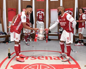 Images Dated 2nd August 2020: Arsenal's Aubameyang and Lacazette Celebrate FA Cup Victory Amid Empty Wembley Stadium