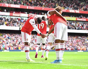 Arsenal v Burnley 2019-20 Collection: Arsenal's Aubameyang and Lacazette Celebrate Goal Scoring Duo Against Burnley (2019-20)
