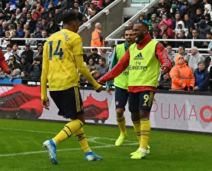 Newcastle United V Arsenal 2019-20 Prints: Arsenal's Aubameyang and Lacazette: Unstoppable Duo in Full Swing - Celebrating a Goal Against Newcastle United