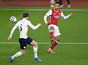 Arsenal V Manchester City 2020-21 Prints: Arsenal's Aubameyang Outmaneuvers Manchester City's Stones: A Behind-Closed-Doors Battle in the Premier League