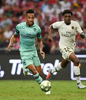 Arsenal's Aubameyang Outmaneuvers Mbe Soh: A Memorable Moment from the Arsenal vs. PSG International Champions Cup Clash, Singapore 2018