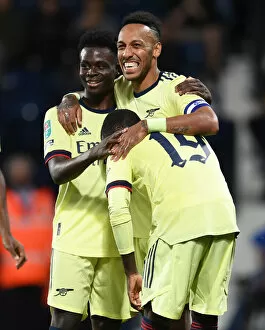 Images Dated 25th August 2021: Arsenal's Aubameyang and Pepe Celebrate Goals Against West Brom in Carabao Cup