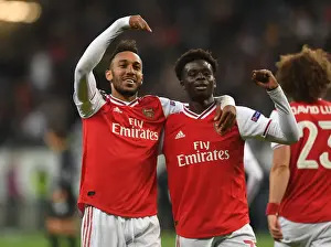 Eintracht Frankfurt V Arsenal 2019-20 Prints: Arsenal's Aubameyang and Saka Celebrate Goals in Eintracht Frankfurt Victory