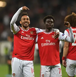 Eintracht Frankfurt V Arsenal 2019-20 Prints: Arsenal's Aubameyang and Saka Celebrate Goals in Europa League Victory over Eintracht Frankfurt