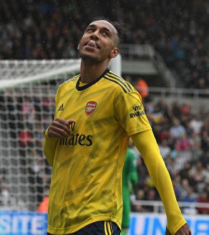 Images Dated 11th August 2019: Arsenal's Aubameyang Scores Brilliant Goals in Premier League Victory over Newcastle United