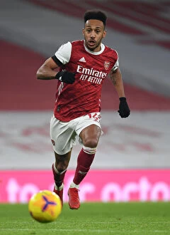 Arsenal v Wolverhampton Wanderers 2020-21 Collection: Arsenal's Aubameyang Shines in Empty Emirates Against Wolverhampton Wanderers (2020-21)