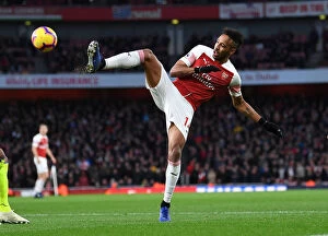 Arsenal v Huddersfield Town - 2018-19 Collection: Arsenal's Aubameyang Shines in Premier League Clash Against Huddersfield