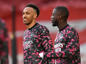 Arsenal's Aubameyang in UEFA Europa League Semi-Final: Emirates Stadium Showdown Amidst Pandemic Restrictions