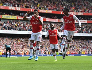 Arsenal v Burnley 2019-20 Collection: Arsenal's Aubameyang and Willock Celebrate Goals Against Burnley in 2019-20 Premier League