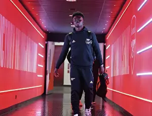 Arsenal V West Ham United 2022-23 Prints: Arsenal's Battle-Ready Saka: Gunning for Victory Against West Ham United in the Premier League