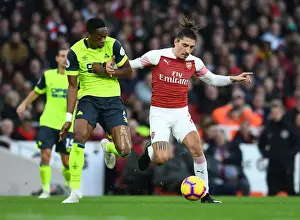 Arsenal V Huddersfield Town - 2018-19 Prints: Arsenal's Bellerin Clashes with Huddersfield's Kongolo in Premier League Showdown