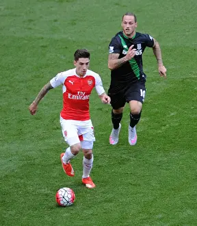 Arsenal V Stoke City 2015-16 Prints: Arsenal's Bellerin Faces Off Against Arnautovic in Intense Premier League Clash