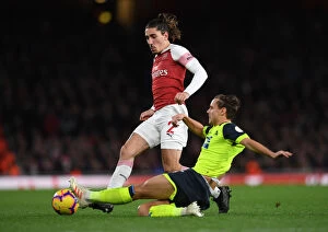 Arsenal v Huddersfield Town - 2018-19 Collection: Arsenal's Bellerin Faces Off Against Huddersfield's Lowe in Premier League Clash