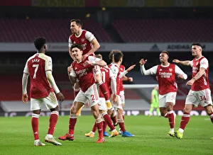 Arsenal's Bellerin, Saka, and Cedric: Celebrating a Triumphant Three-Goal Spree Against Leeds United in the Premier League, 2021